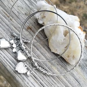 three silver heart charm bracelets